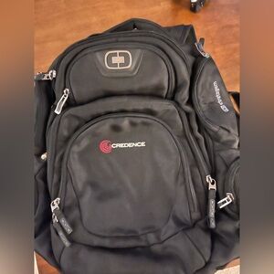 Black Backpack for men Ogio Stratagem with Credence Logo.